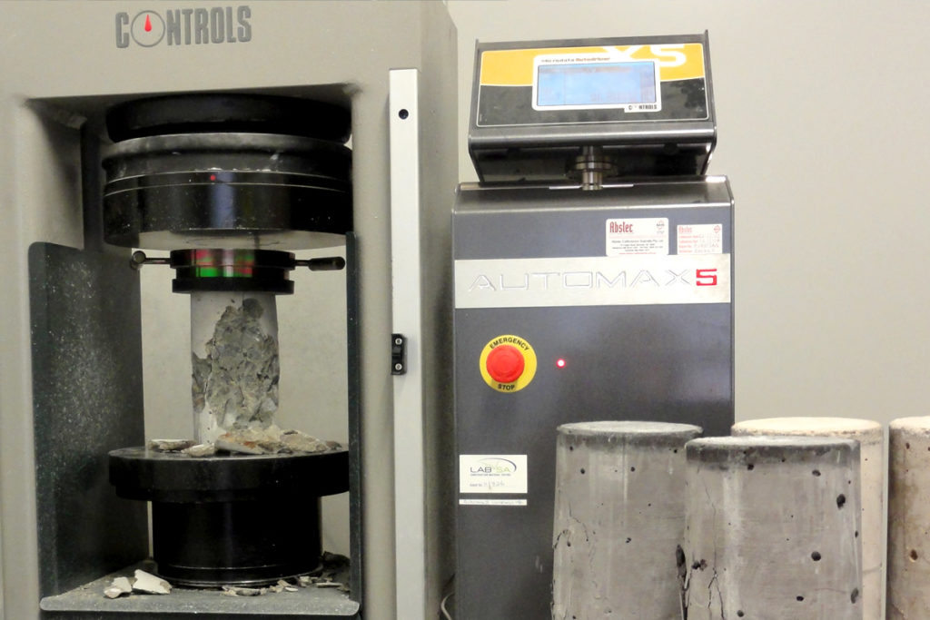 Concrete compression testing.